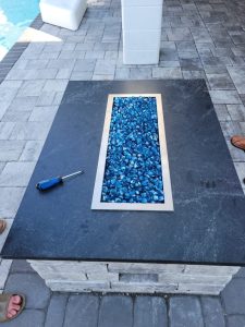 paver patio fire feature by pool myrtle beach