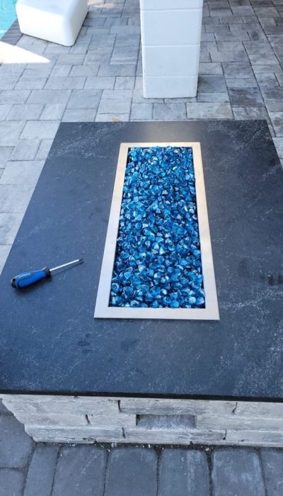 paver patio fire feature by pool myrtle beach